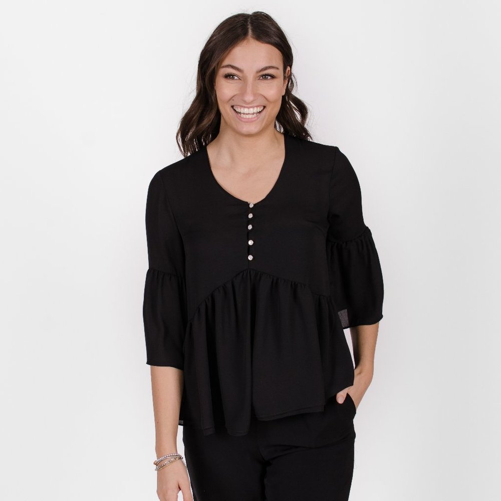 Loose black blouse with flared sleeves and V-neck